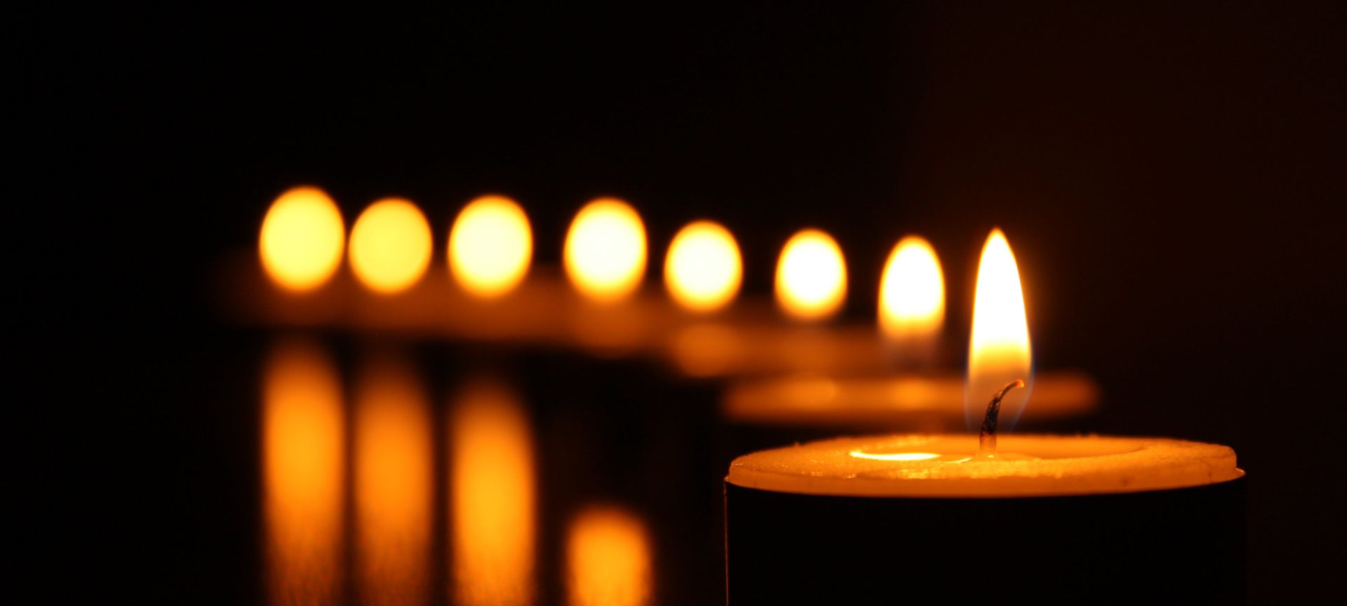 A Group Of Lit Candles