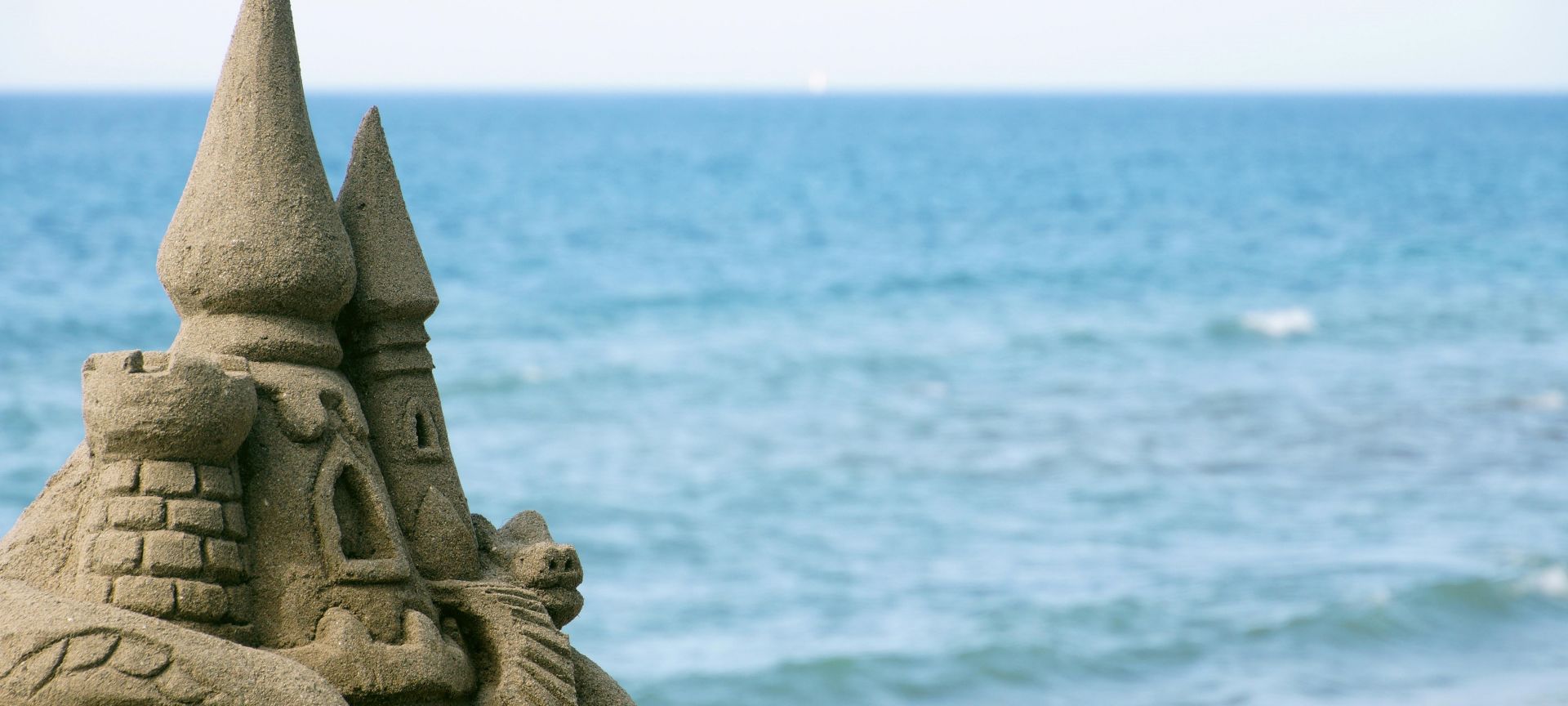 A Stone Sculpture On A Beach